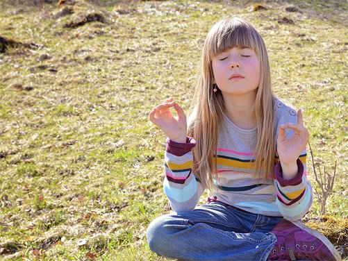 Young girl meditating